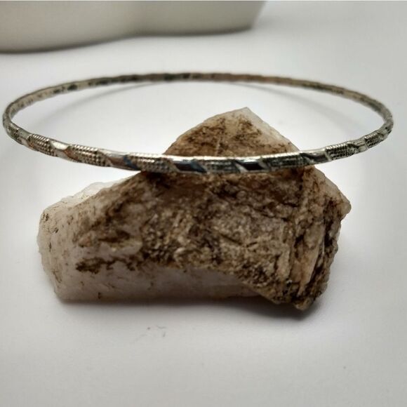 Silver toned Aztec tracks bracelet - Picture 1 of 3